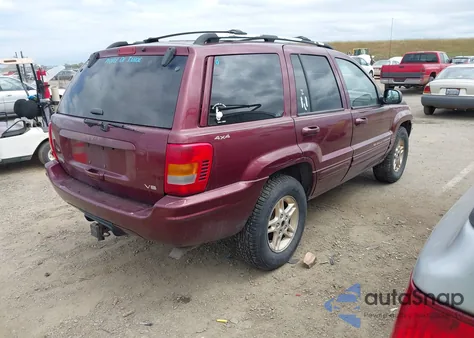 1999 Jeep Grand Cherokee Limited from USA, damaged, VIN 1J4GW68N3XC696825
